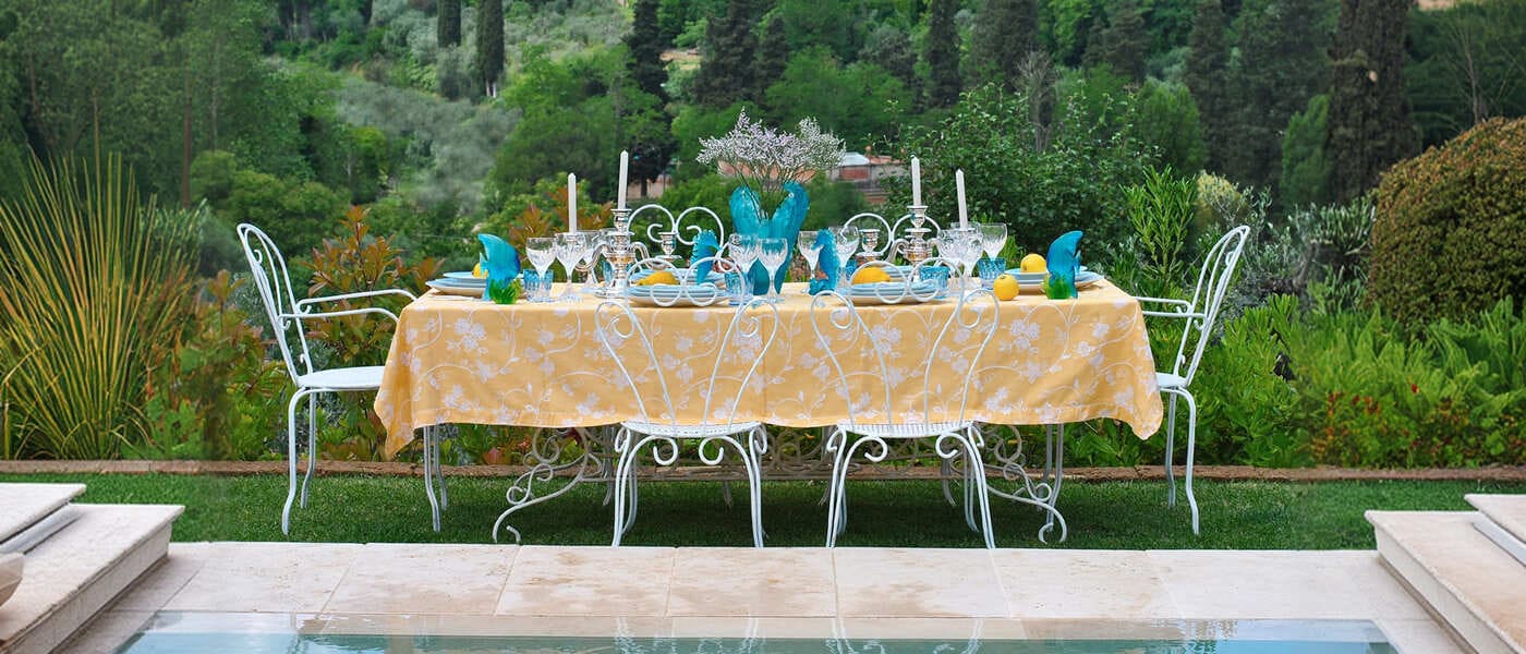 Elegantly set table with porcelain and crystals